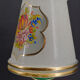 Paire de lampes en faïence verte et dorée, circa 1940