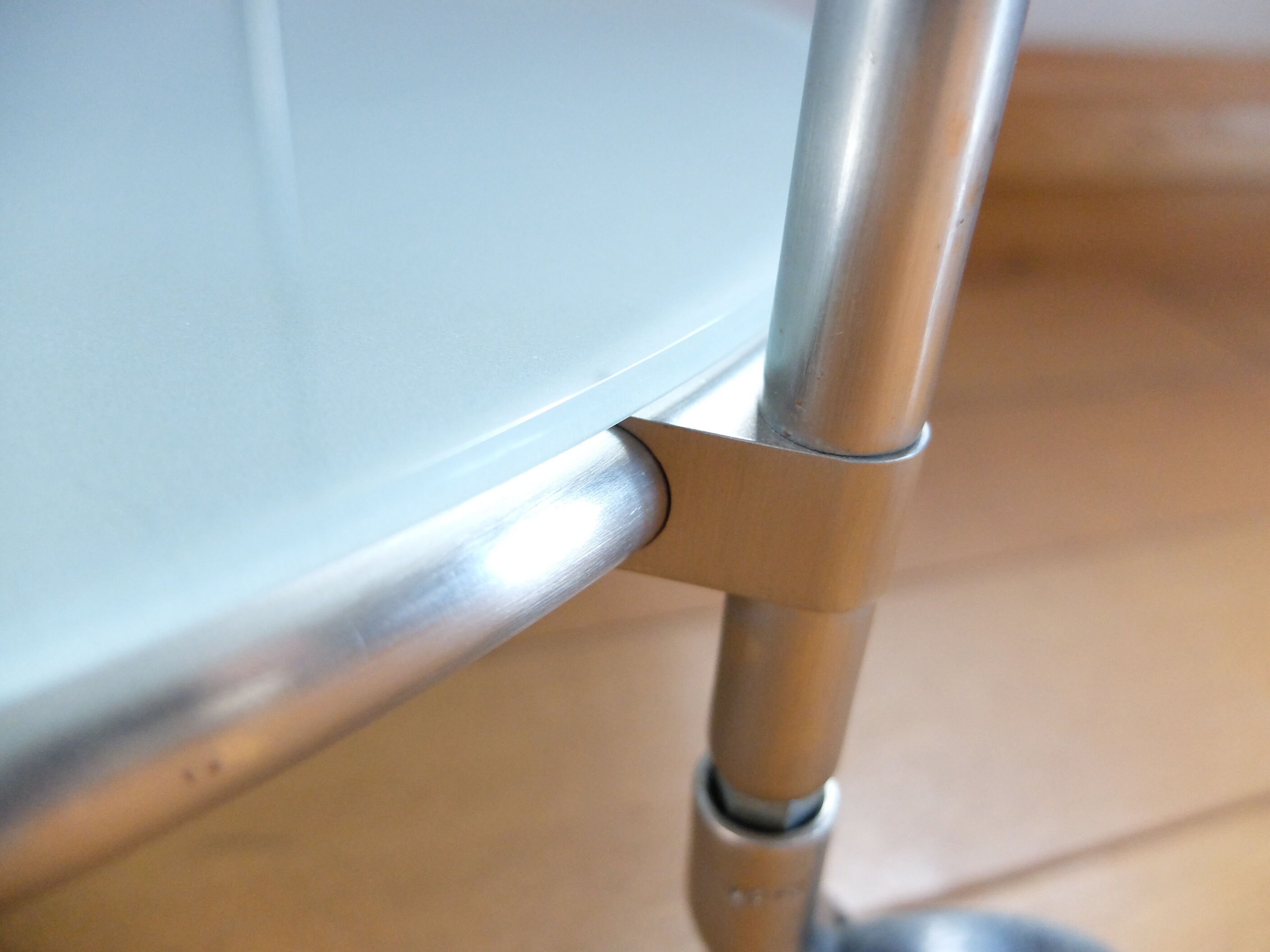 1970s stainless steel pedestal table with two glass tops