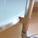 1970s stainless steel pedestal table with two glass tops