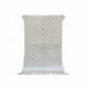 Small Moroccan rug with white diamonds.