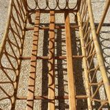 Children's bed in vintage rattan from the 1950s