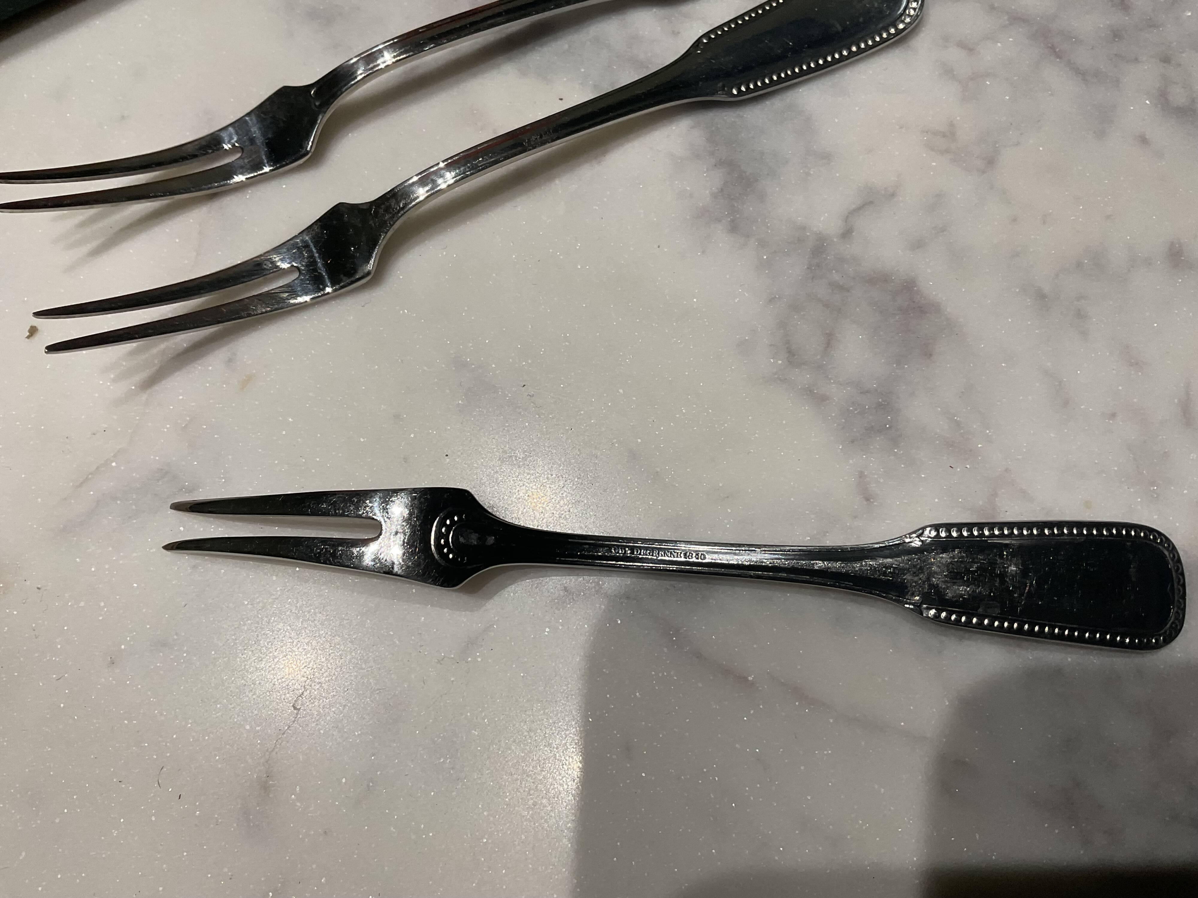 Set of 12 snail forks. Guy Degrenne