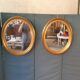 Pair of golden oval mirrors