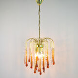 A pair of Mid Century 70's waterfall chandeliers. Murano glass amber drops. Paolo Venini style.