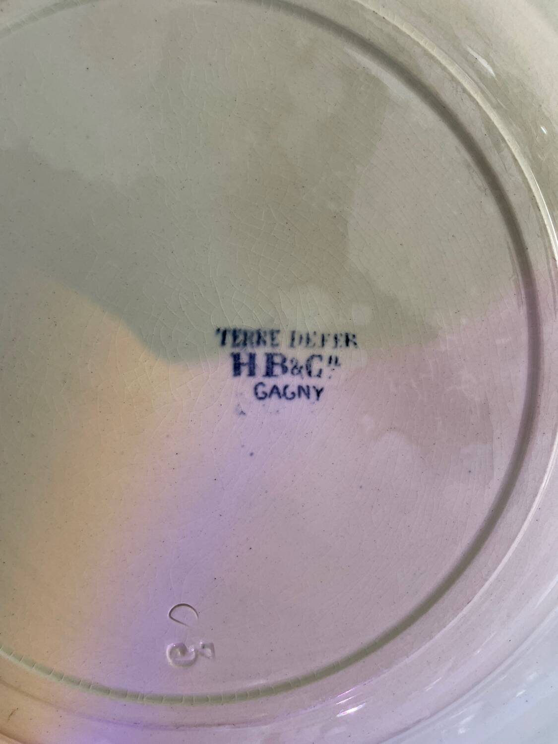 Large iron earth dish