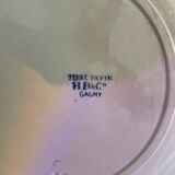 Large iron earth dish