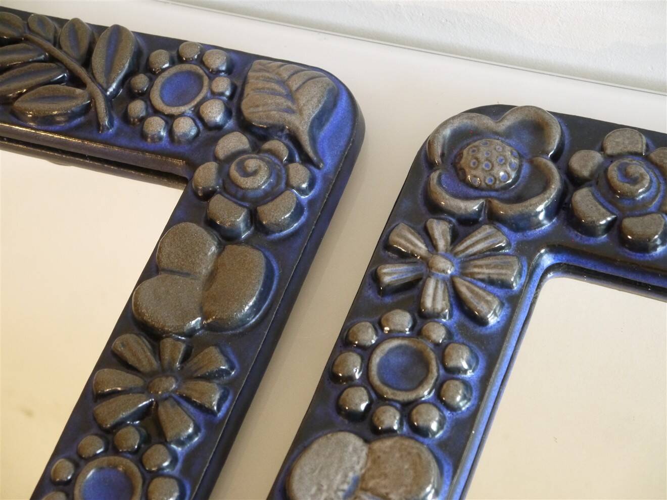 Pair of Scandinavian mirrors in ceramic by Berit Ternell.