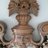 Old carved wooden pediment