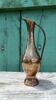 Carafe vase in chiseled brass