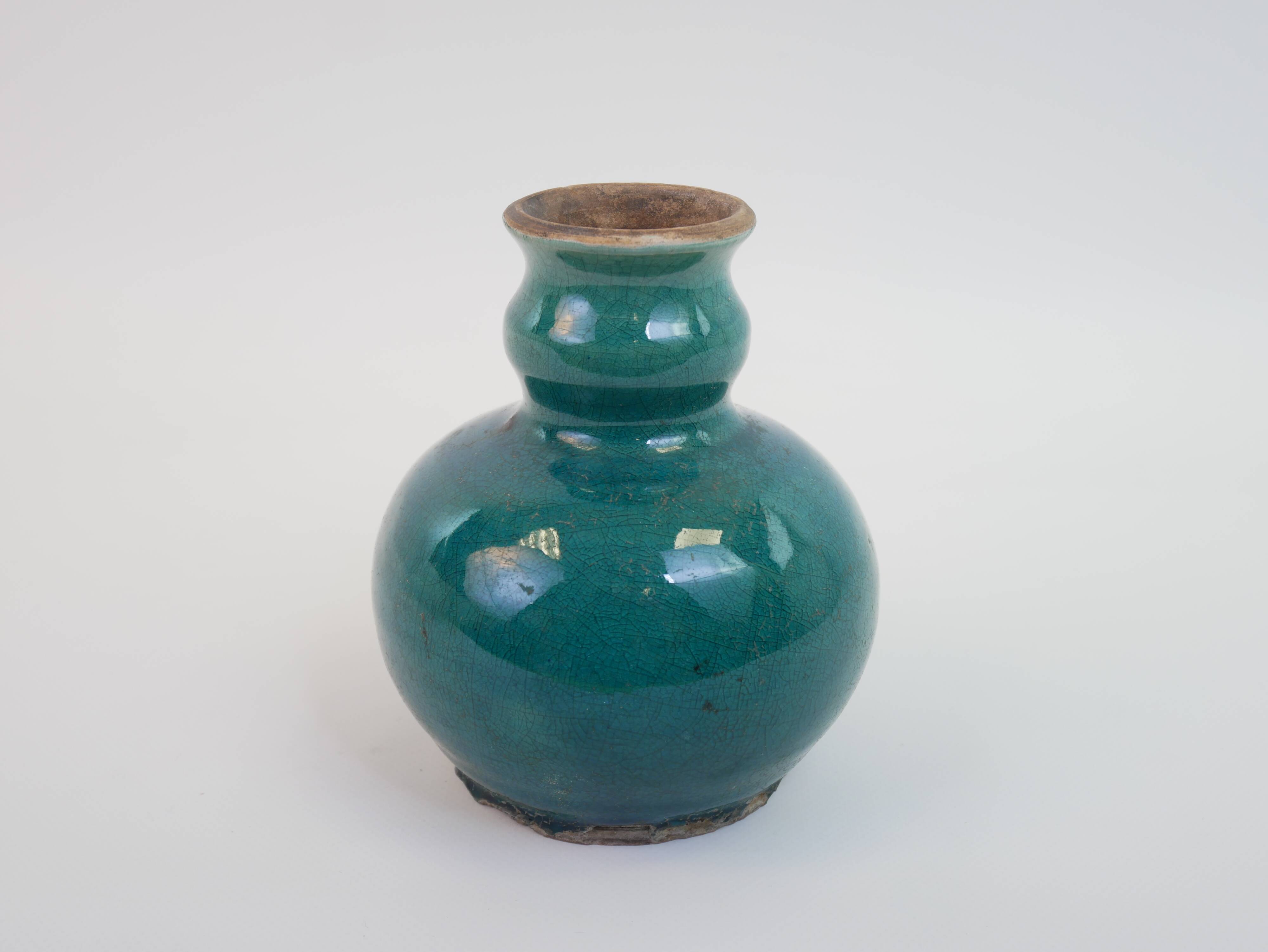 Small old blue ceramic vase