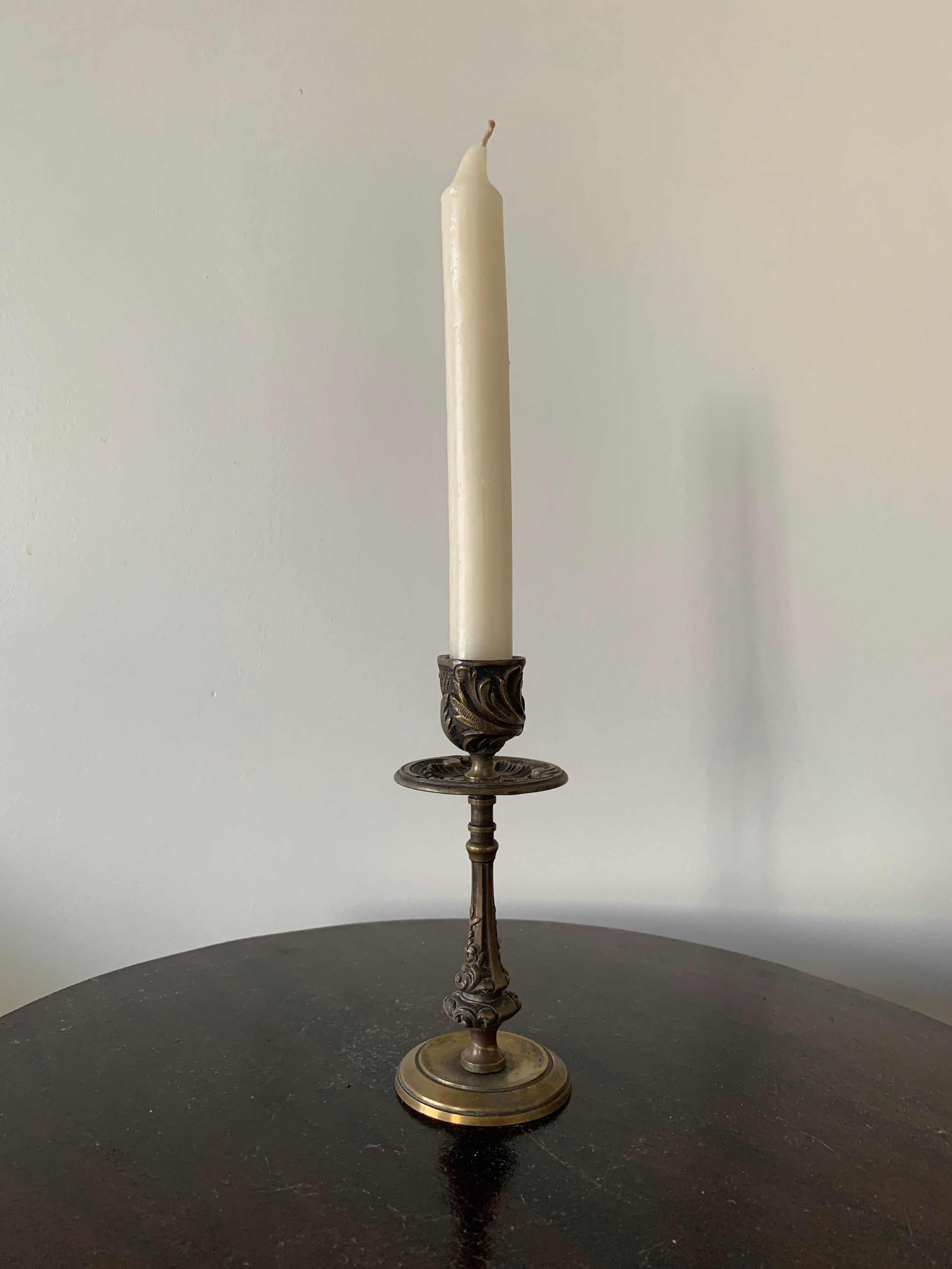 Antique bronze candle holder