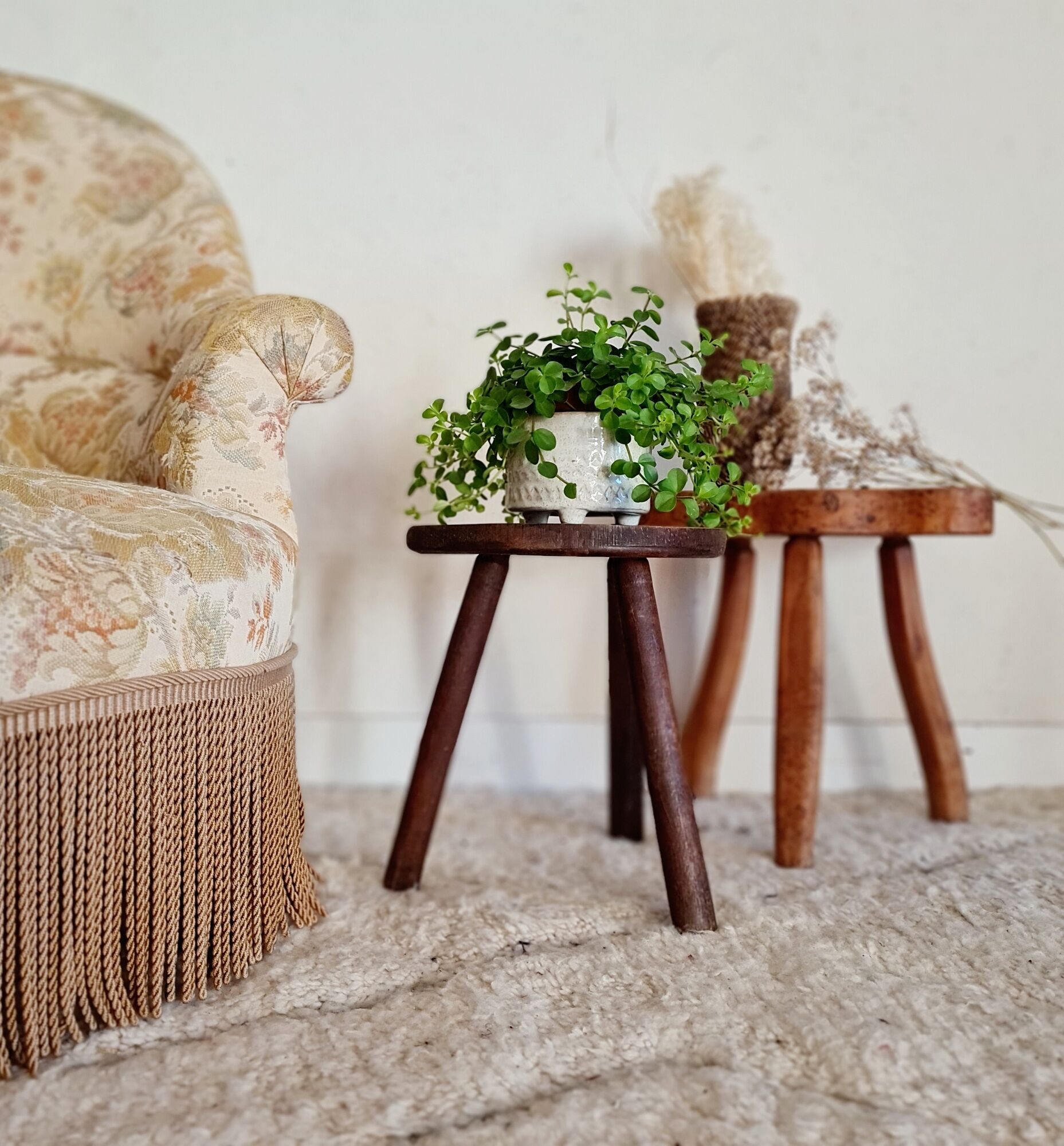Old wooden tripod wooden farm stool made of wood