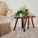 Old wooden tripod wooden farm stool made of wood