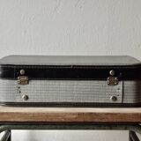 Old cardboard suitcase with its two keys