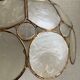 Suspension nacre et laiton
