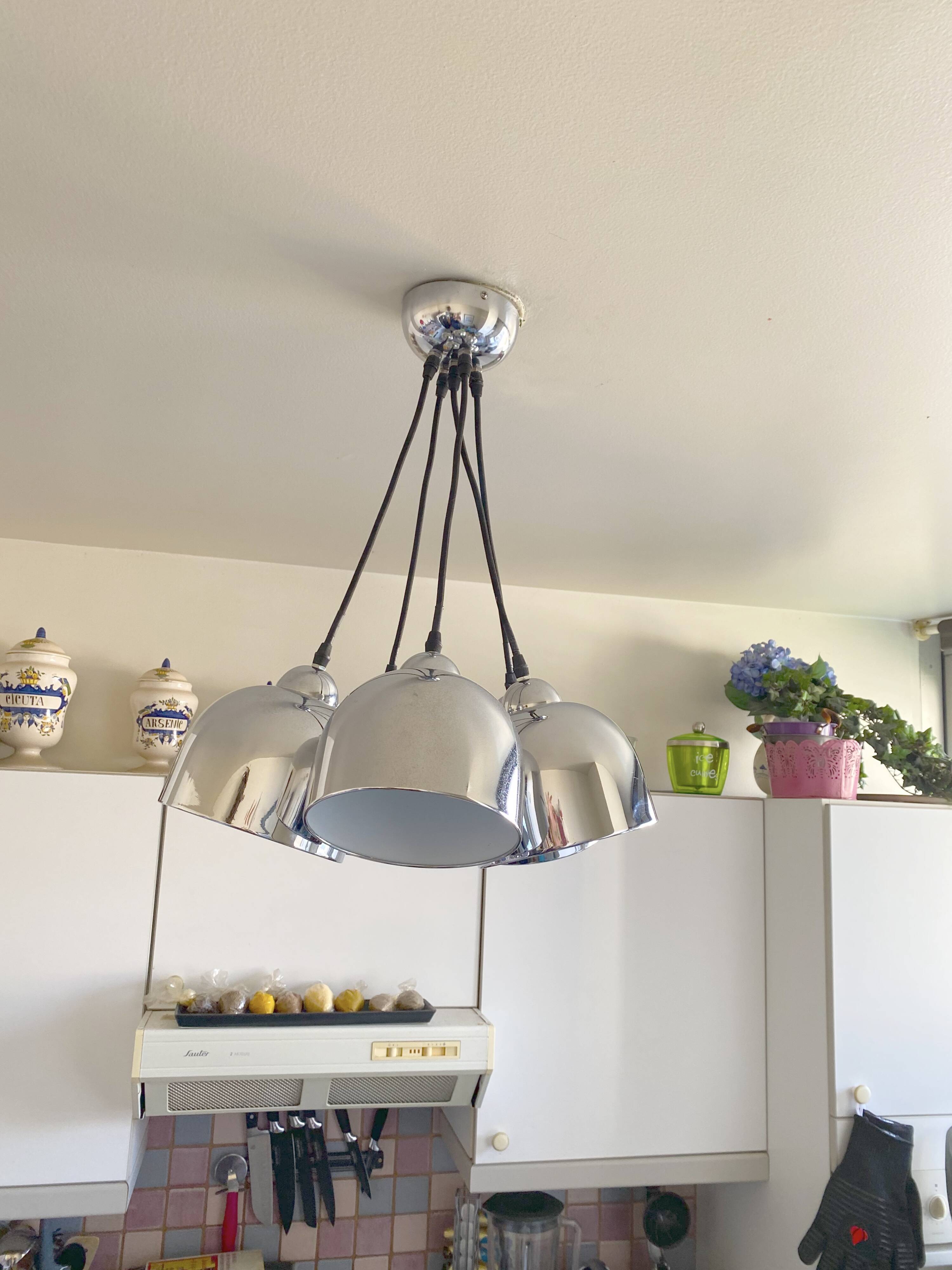 Suspended bell luminaires