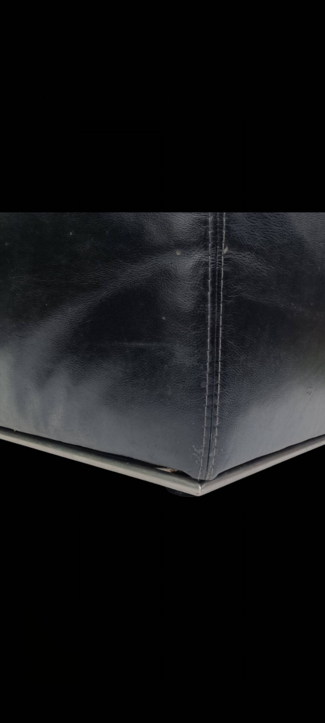 Pair of vintage black leather easy chairs