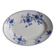 Antique serving dish in white and blue earthenware.
