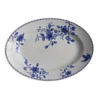 Antique serving dish in white and blue earthenware.