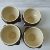 mini earthenware soup tureens in brown and beige inside.
