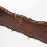 Art Nouveau style coat rack in oak with brass hooks, France ca. 1915