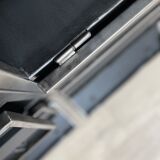 Industrial row in metal and oak.