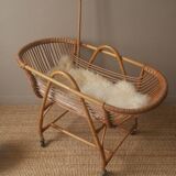 Vintage rattan cradle bassinet on wheels retro Scandinavian design baby bed