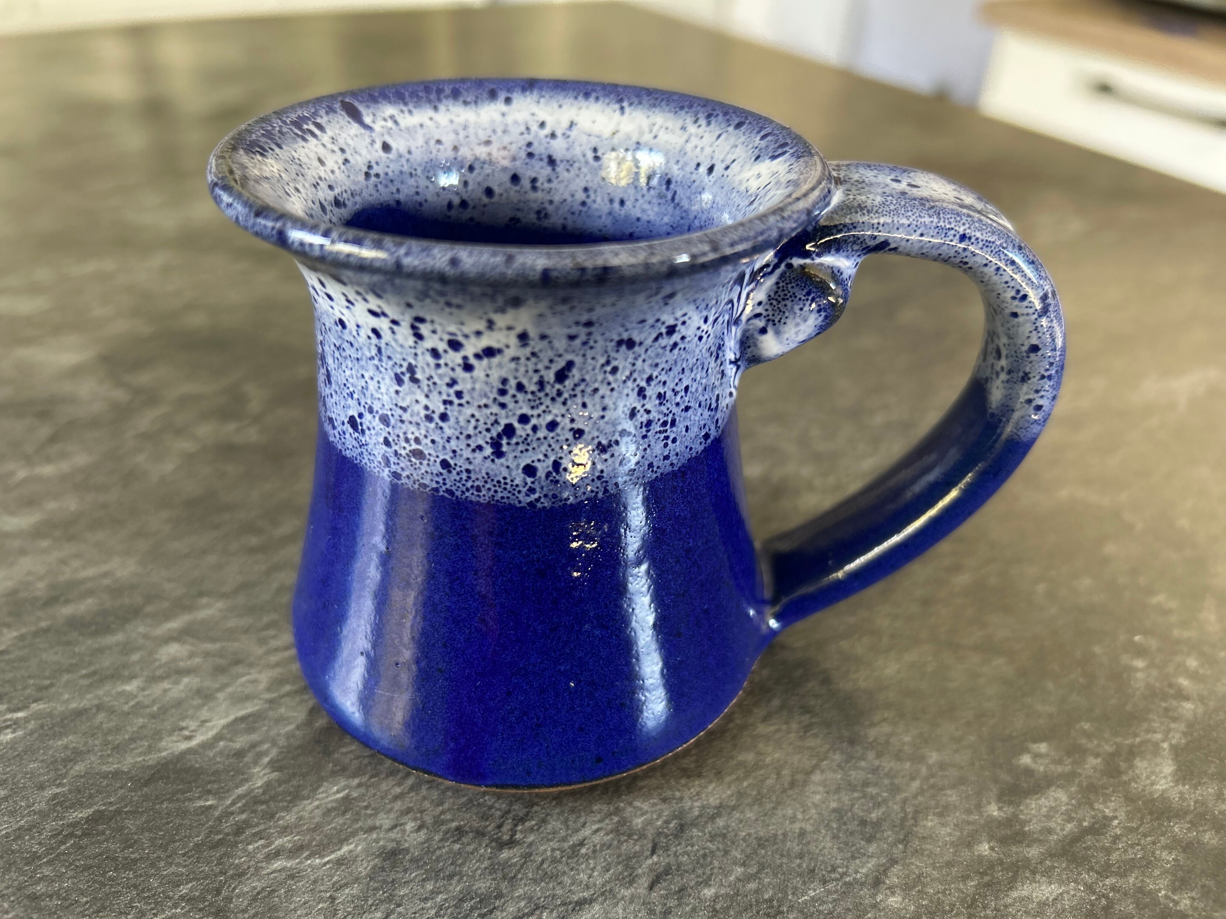Small enamelled earthenware milk jug