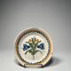 Two antique 18th-century faience plates, stapled.