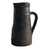 Pitcher, watering can in dark brown ceramic with matte finish.