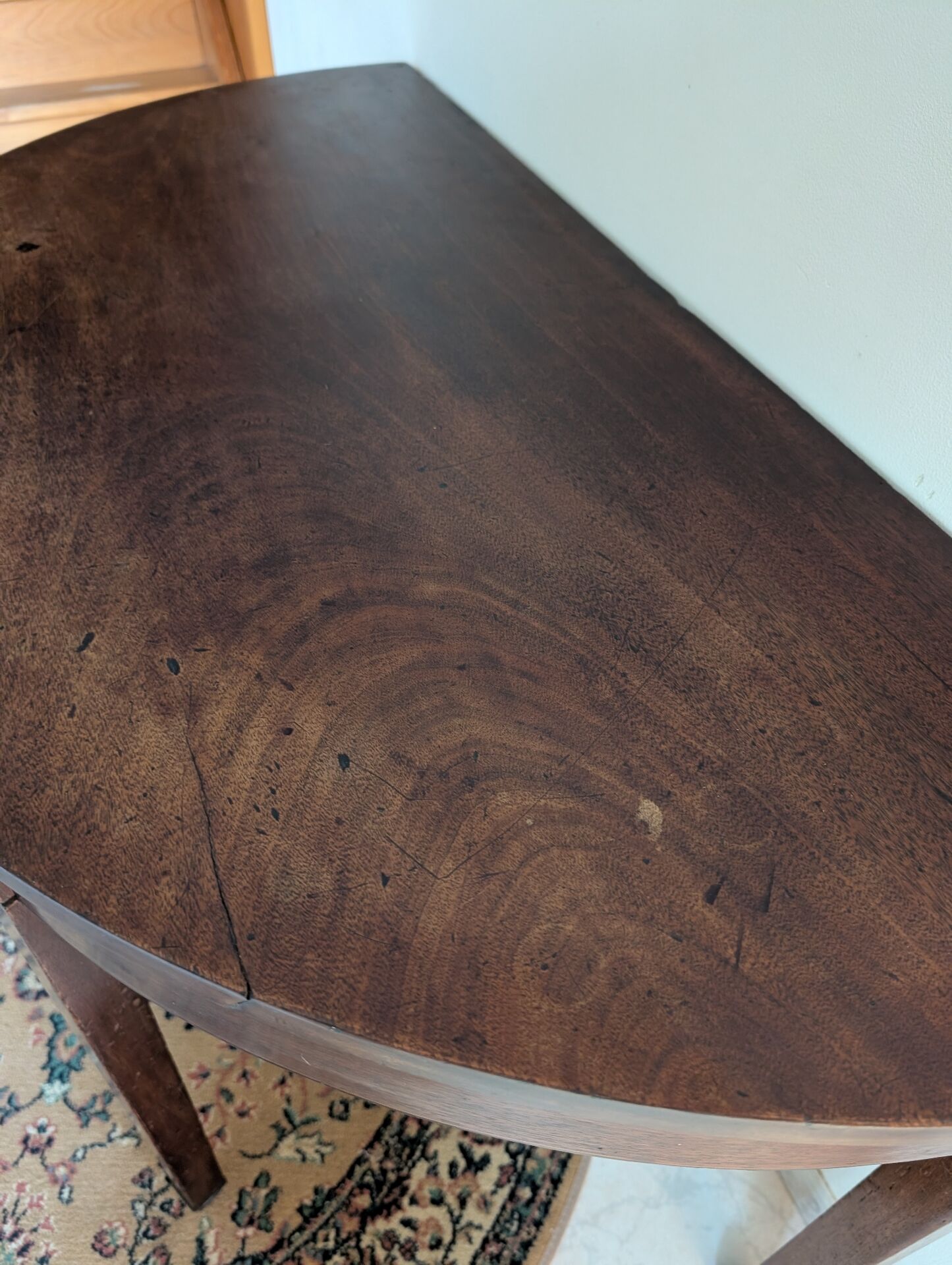 Old half-moon table or serving trolley on wheels