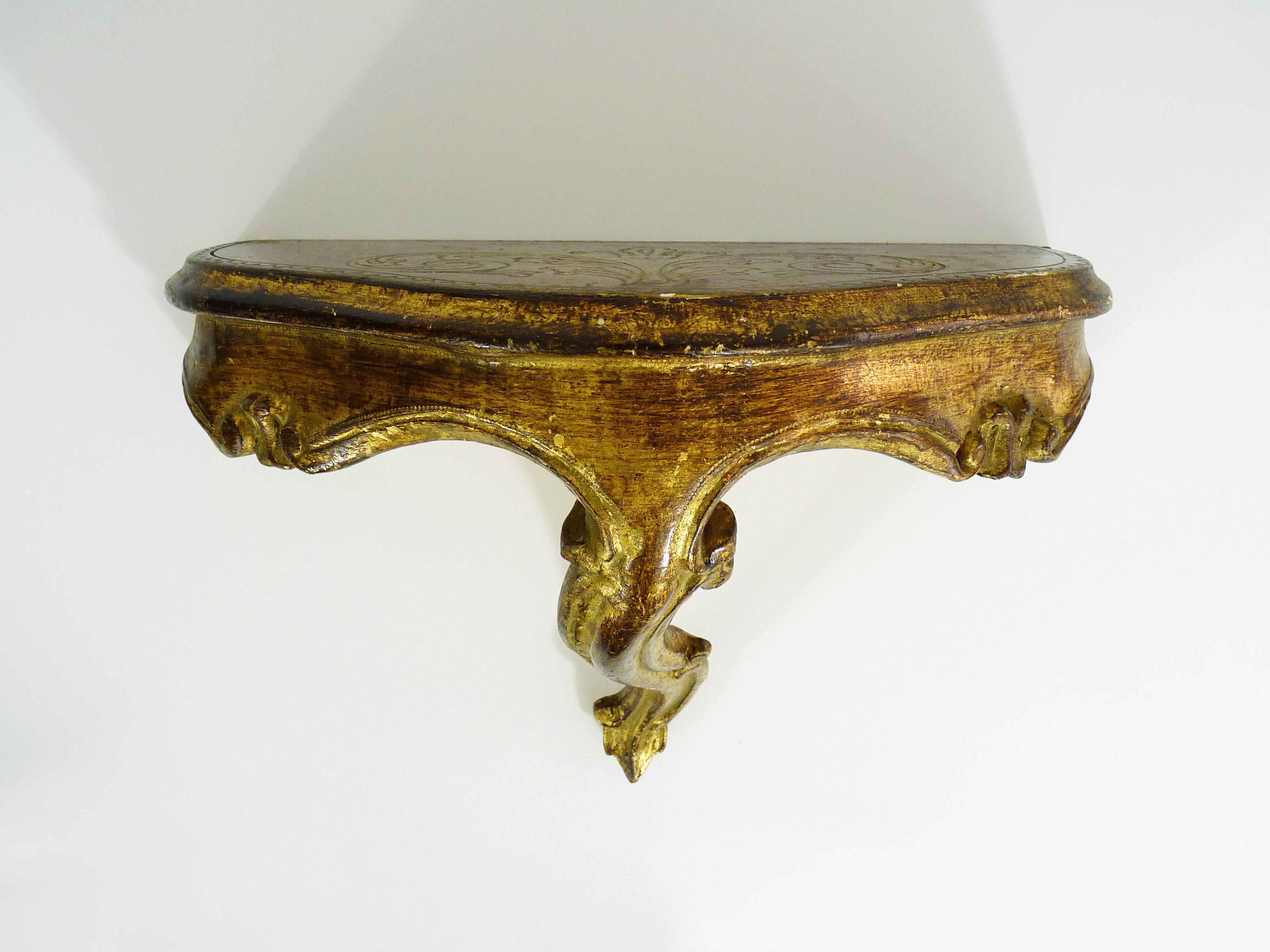Vintage Florentine console in hand-painted and gilded wood. Year 50