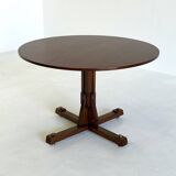 Wooden round dining table from ISA Bergamo with unique base