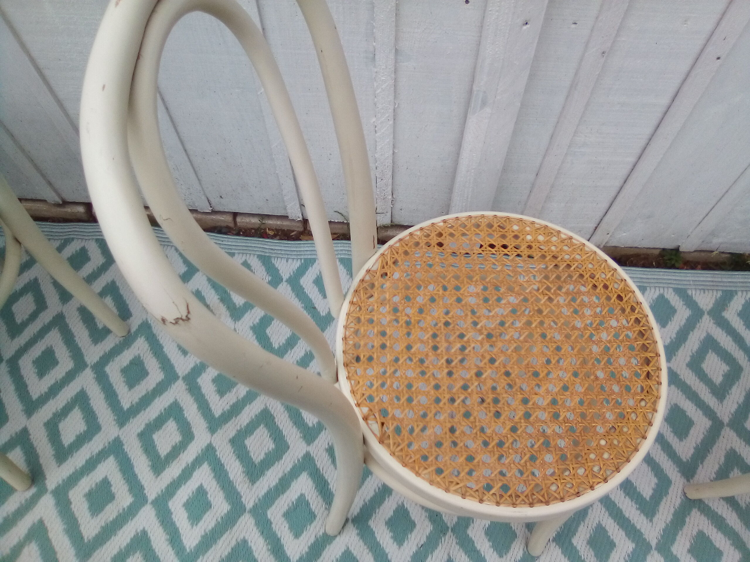 Lot of 4 bistro chairs in caned wood