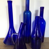 Series of five bottles / jars of cobalt blue apothecary