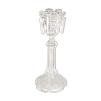 Old candlestick with molded glass stamps