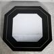 70s mirror, black lacquered wood, brass edging. Octagonal