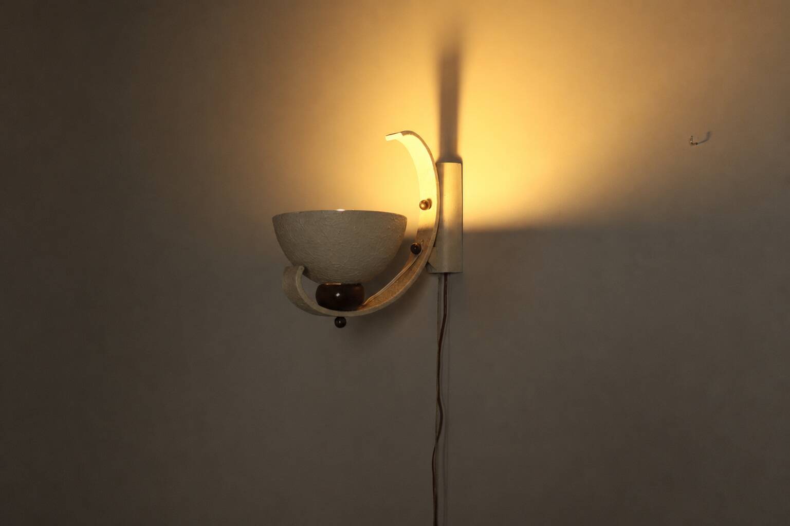 Pair of sculptural mid-century wall uplighters, circa 1950
