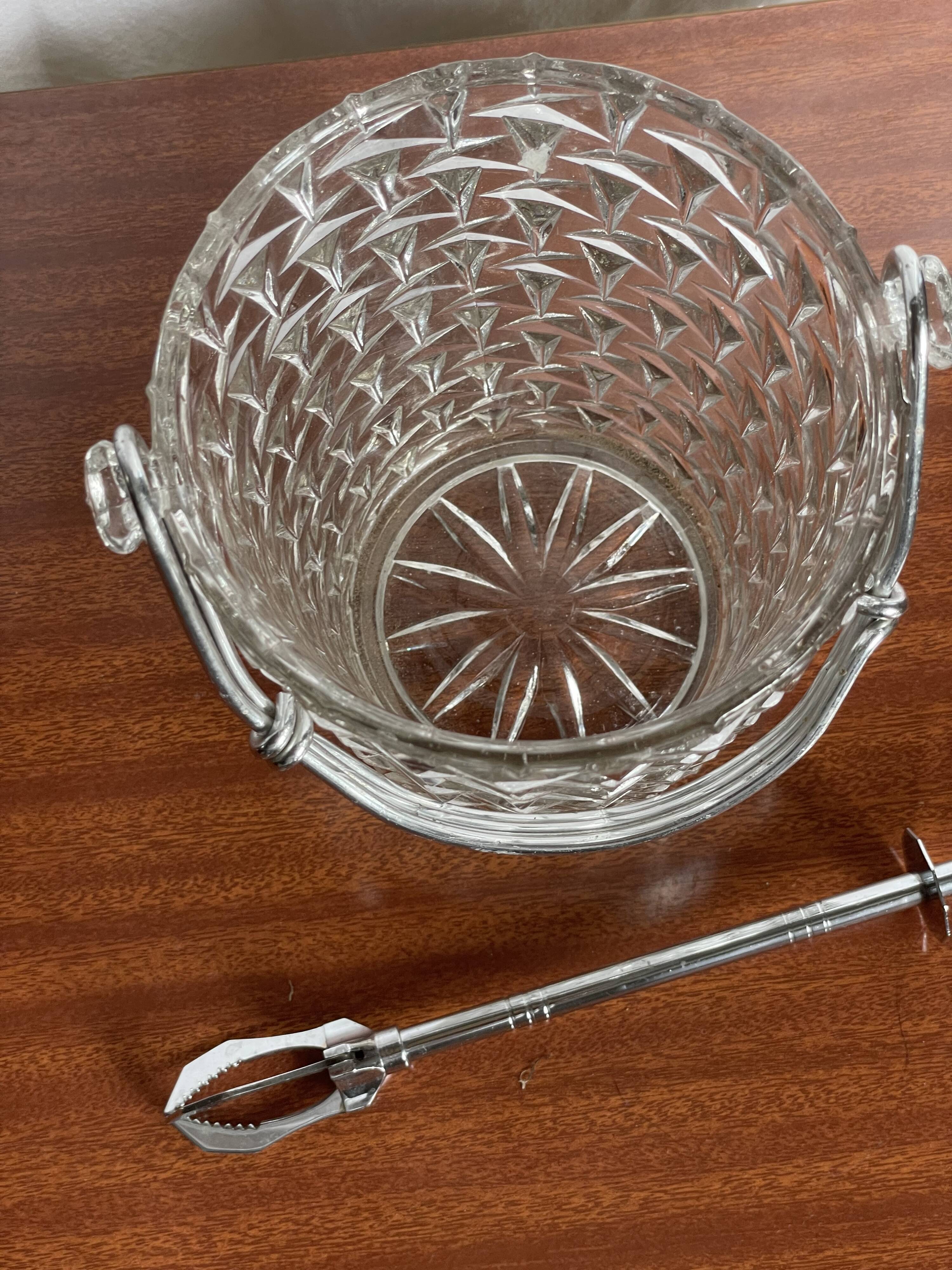 Vintage chiseled glass ice bucket with pliers