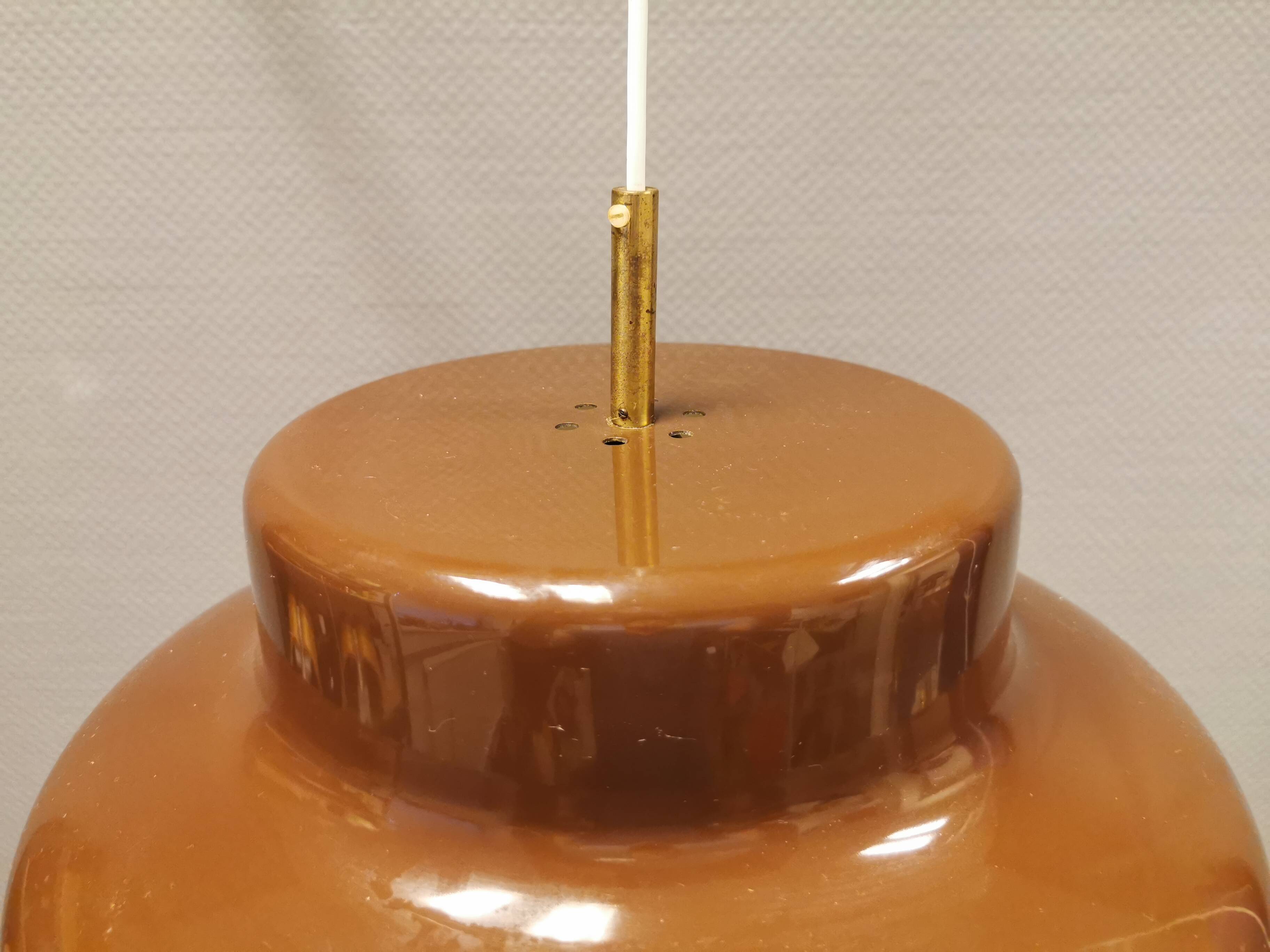 Large chocolate brown industrial-style hanging lamp, in lightweight metal.