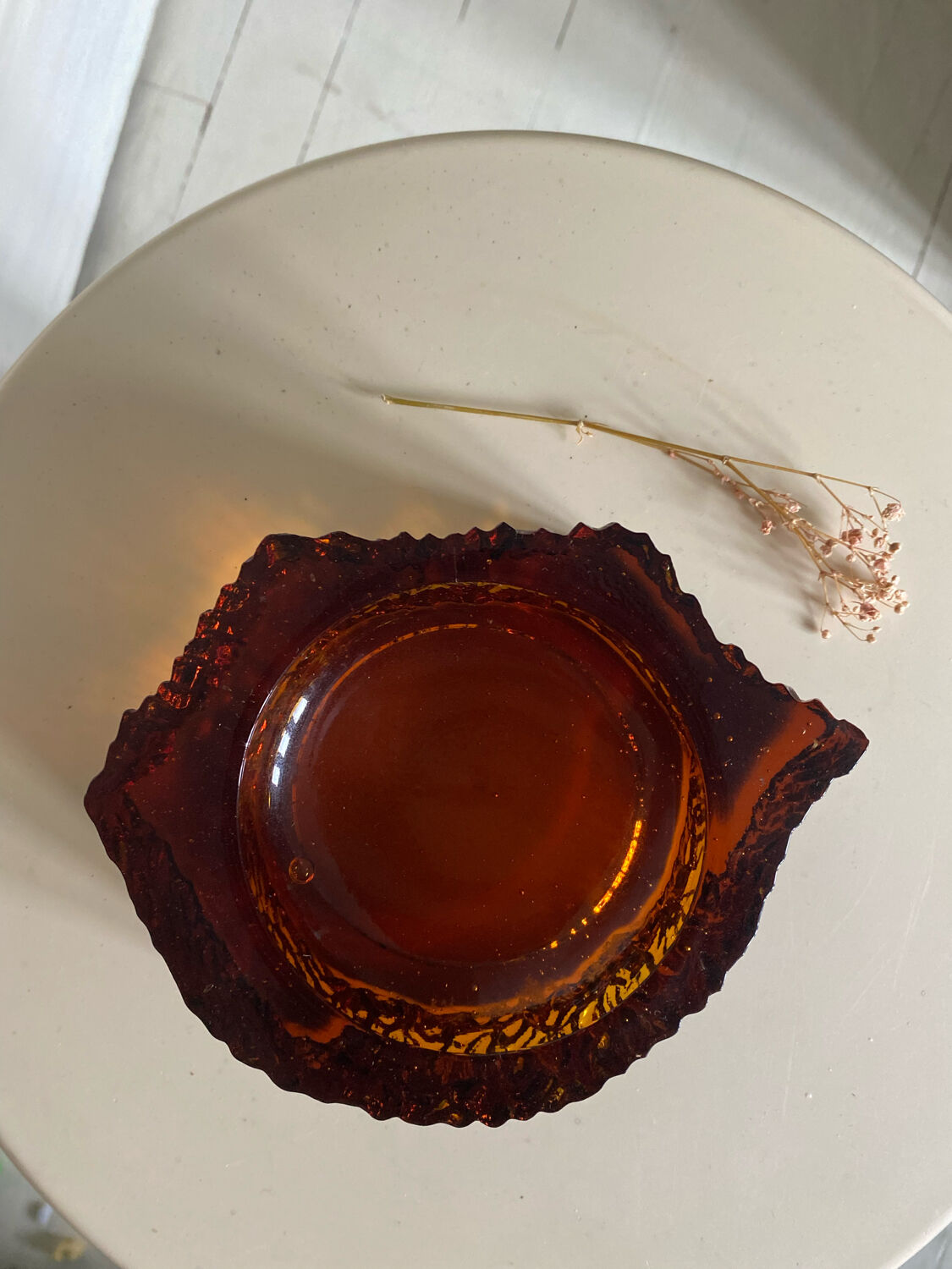 Ashtray in amber bubbled glass