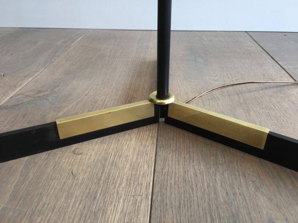 Designer floor lamp in black lacquered metal and brass