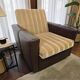 Fauteuil vintage en skaï brun / fauteuil club rétro sur roulettes