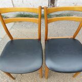 Pair of Scandinavian chairs in teak and black skaï, 60s