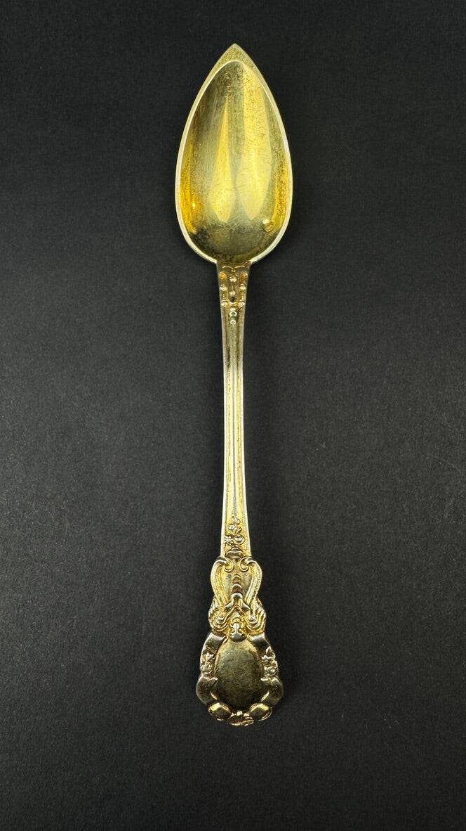 12 dessert spoons in vermeil, Minerva 19th century, blackened pear tree box