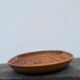 Carved wooden pocket emptier