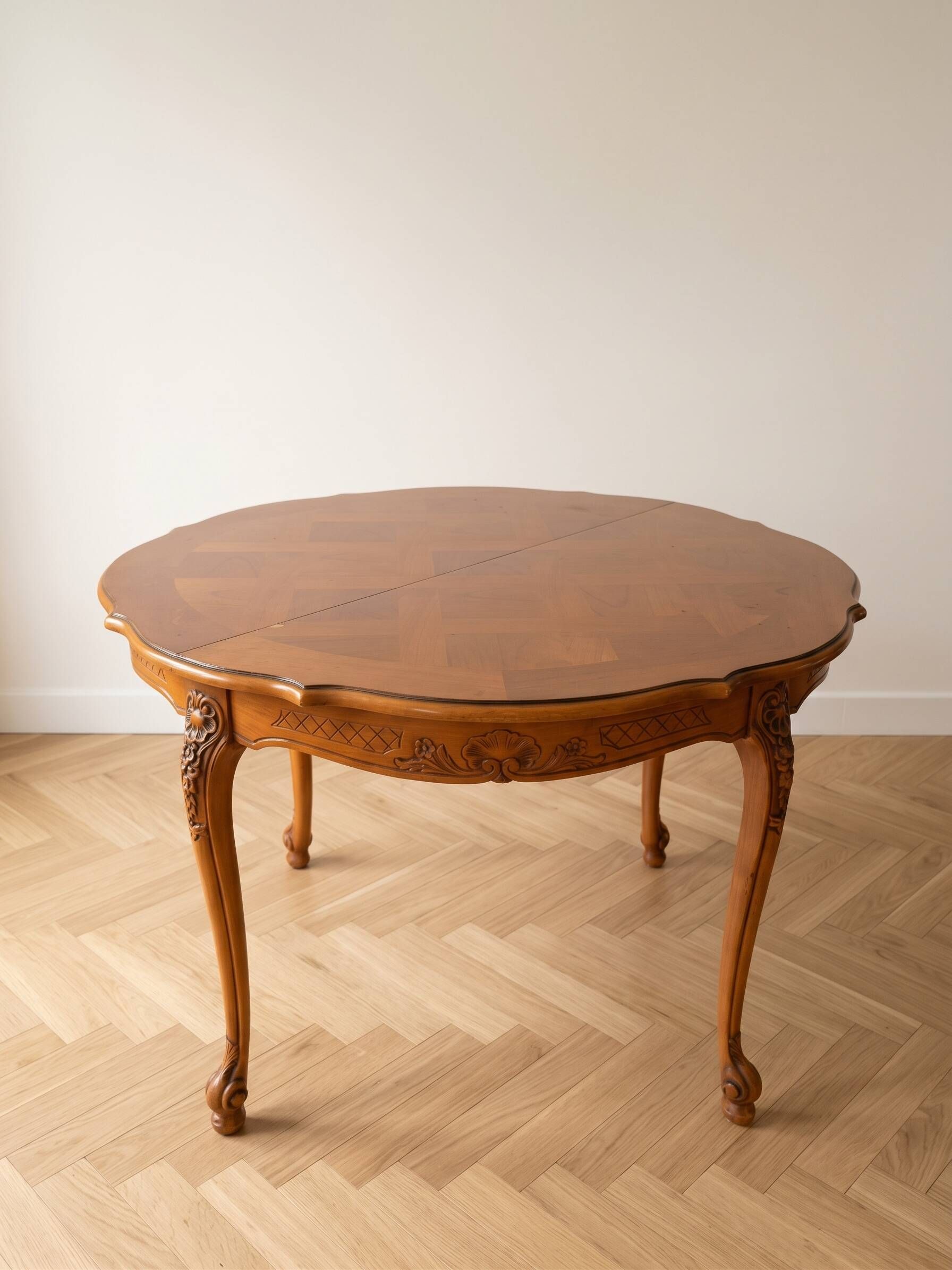 Round Louis XV dining table in solid cherry wood.