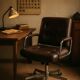 Vintage strafor brown leather armchair with casters