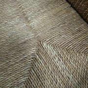 Vintage French papercord sofa with a metal frame base
