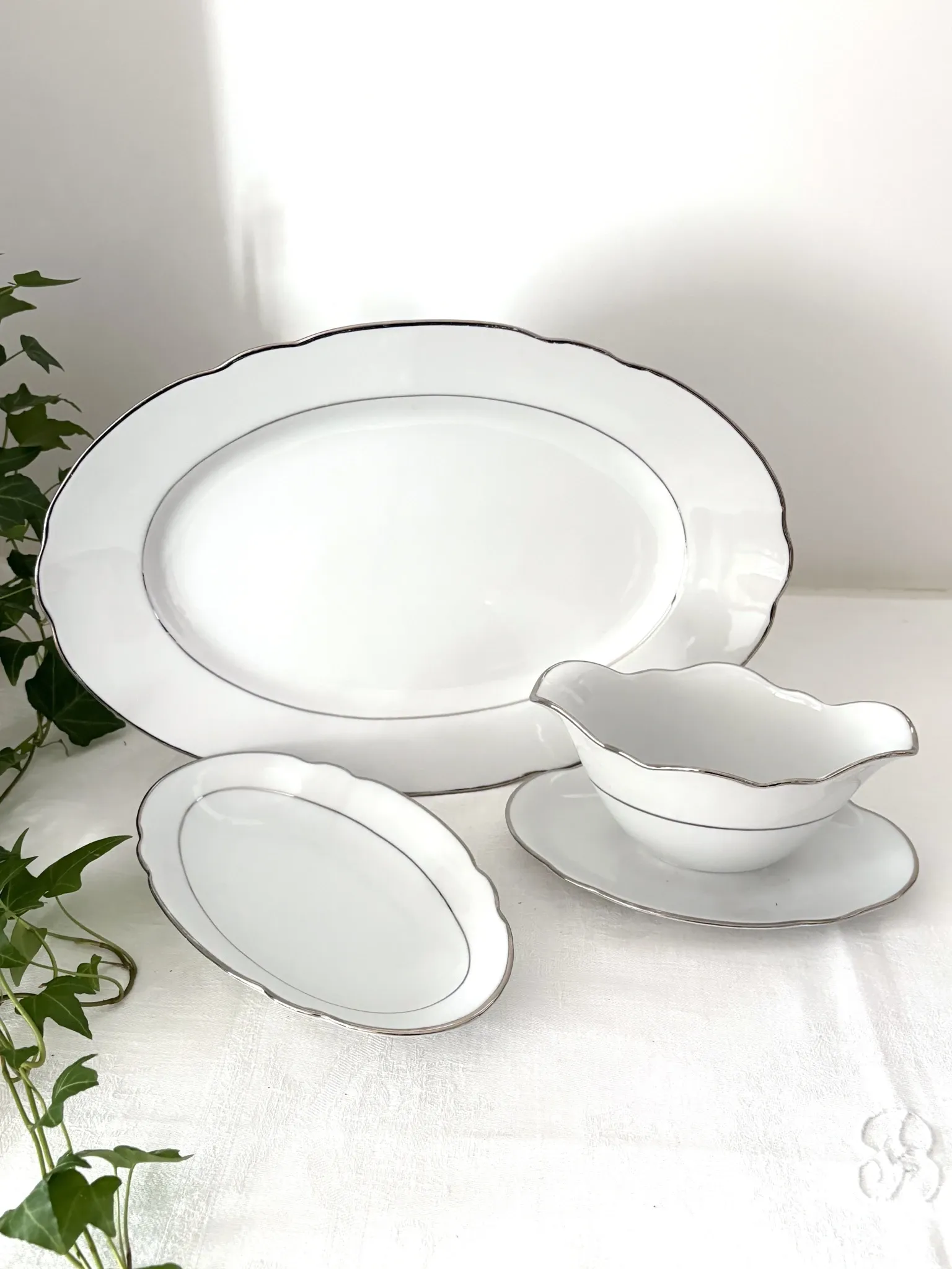 3 white porcelain plates